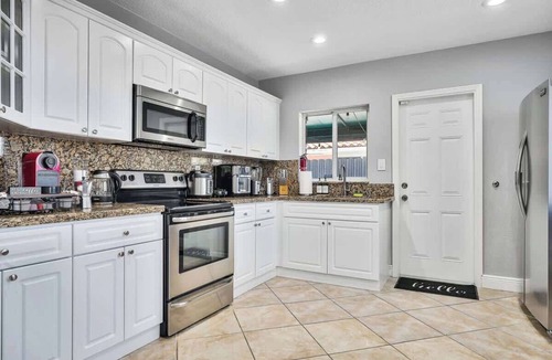 Coral Way House | 2 Homes, King Beds, for 23 NearBeach/Airport