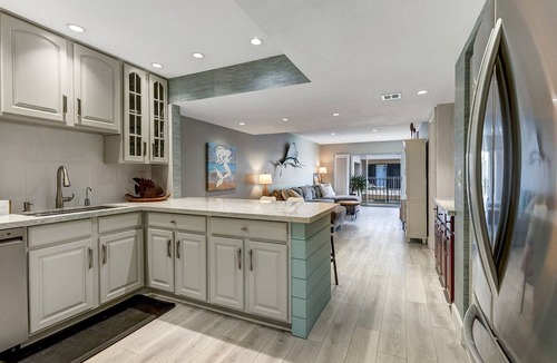 Islamorada Condo | 2BR Islamorada condo with pool, gym, balcony, and full kitchen.