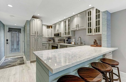 Islamorada Condo | 2BR Islamorada condo with pool, gym, balcony, and full kitchen.