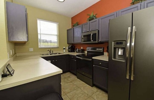 Davenport House | 3 bedroom villa (Sleeps 8) in a tropical Tuscan style resort near Disney