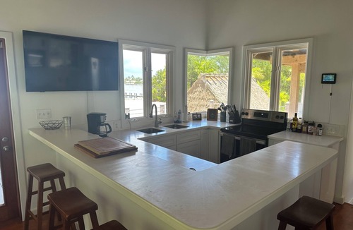 Tingler Island Villa | 30 DAY RENTAL ONLY! Beautiful 2.5 acre waterfront villa with pool , & tiki bar