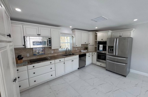 Melbourne Beach House | 4 Bedroom House on Indian River: dock, pool, beach access. Wheelchair friendly.