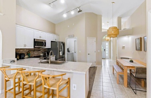 Historic Downtown Kissimmee House | 4 BR Private Pool and Lake View Near Disney