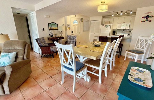Fort Pierce Condo | 🏖️ 40 Steps to the Beach! Ground Floor Condo . Golf, Pools & Tiki Bar and more.