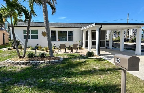 Mid Island House | 4850 Coral Pet Friendly Pool Home near Beach