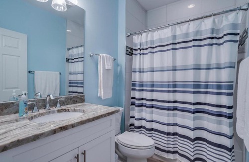 Mid Island House | 5350 Palmetto Street by Coastal Vacation Properties