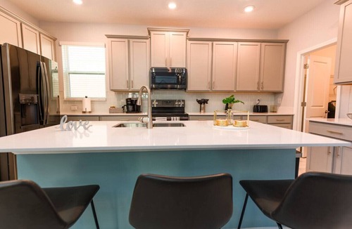 Kissimmee Villa | 5BR villa - pool, hot tub & gym access