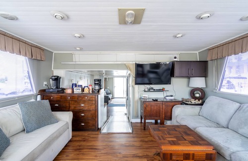 North Fort Myers Boat Rental | 65' Yacht Escape on Private Canal. Fish & Kayak. Support InclusiveInc.org