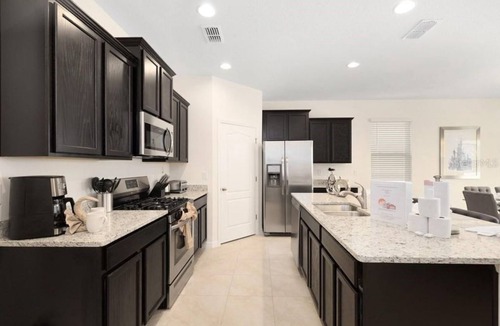 Loughman Resort | 6BR Home with Pool & Games in Resort near Disney