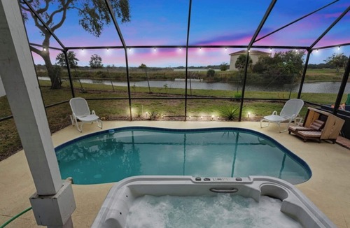 Largo Villa | 6BR Waterfront Heated Pool Hot Tub Game Room