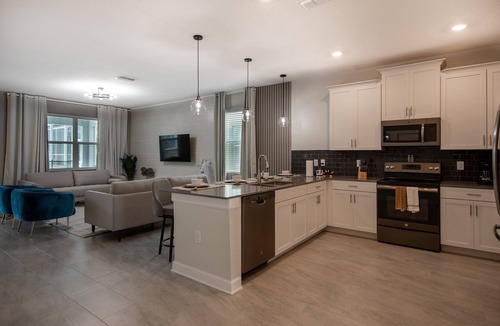 Davenport House | 840DSD-The Retreat at ChampionsGate by RedAwning