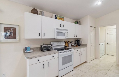 Pebble Beach House | Airy Canal-Front 3BR Home with Heated Pool Minutes to Beaches, Golf & Southwest Florida Adventures