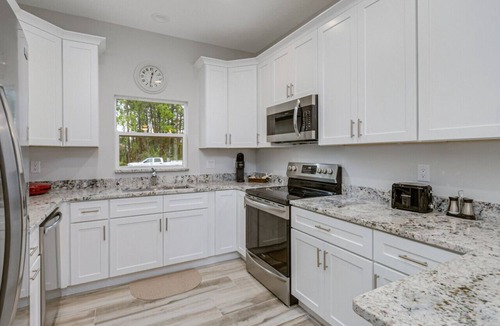 Port Malabar House | All new, lovely, spacious 3bd/2bth unit sleeps 8!