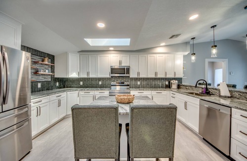 Yacht Club House | All New Luxury Waterfront Home Each Bedroom has full bathroom, Heated Pool&Spa