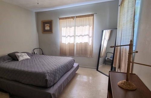 Bayou Oaks House | Art Haven Retreat - Open Plan Home with Sun Room and Fenced Yard