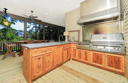 Grayton Beach House | Backyard Creek And Outdoor Kitchen- Jubilee Retreat By Royal Destinations