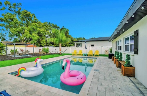 Sun Bay South House | Backyard Paradise: Private Pool, Golf & Fire Pit