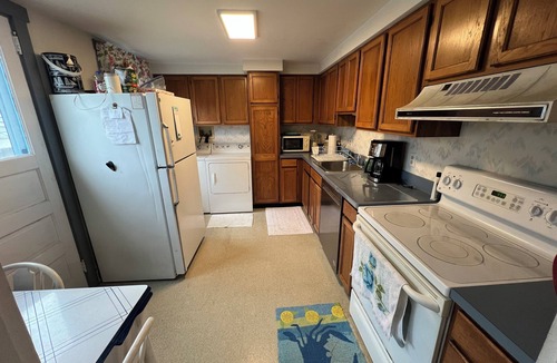Peahala Park House | Beach-block Bungalow at LBI: Classic wood-paneled Cape Cod, 100 yards from beach