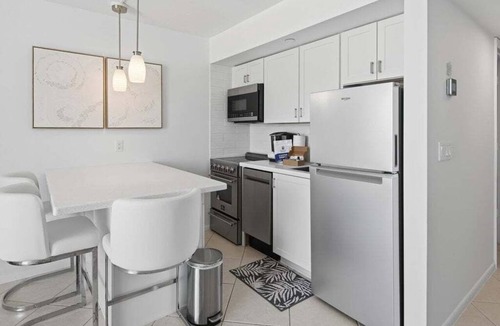 Marco Island Condo | Beachfront 1BR Apollo condo with pool, kitchen, and Gulf views.