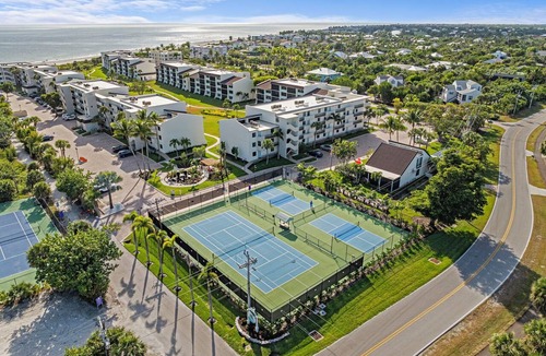 Sanibel Condo | Beachfront Loggerhead Cay 302— comforts of home, Heated Pool, Tennis, Pickleball & Bikes + Beach Gear. Weekly Stays.