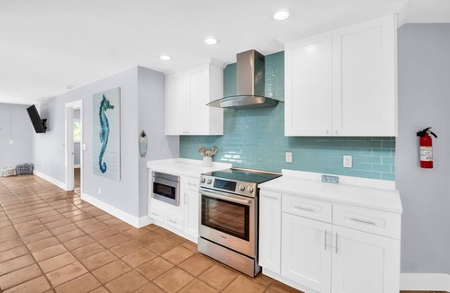Indian Rocks Beach House | Beachside Family Retreat w/Heated Pool & Golf Cart