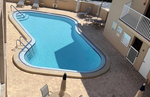 Belleair Beach Condo | Beachside, with endless sunsets, in our modern 2-bedroom in Belleair Beach.