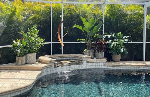 Feather Sound House | Beautiful 4-bedroom house in Clearwater with lagoon like heated pool & hot tub.