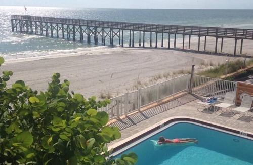 Redington Beach Condo | Beautiful Condo on Miles of White Sand Beach. Watch Dolphins from your bedroom!