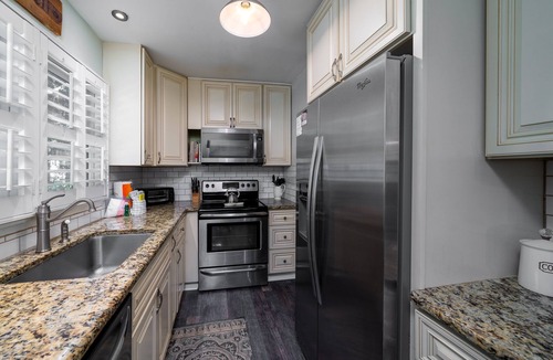 Tarpon Pond Cottage | Beautiful Cottage! Extra Full Bath! Golf Views! Amenity access included-2 dogs under 50# each