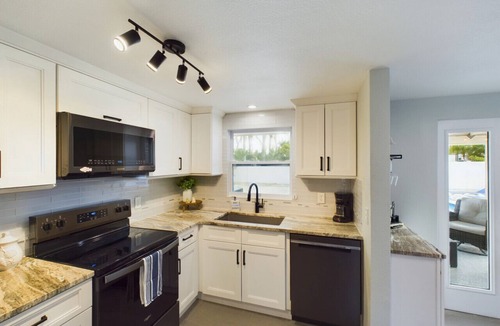 Holmes Beach Cottage | Beautiful New Pool/Spa, Steps to Sand & Restaurants, Golf Cart Included
