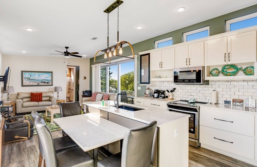 Doctor's Arm House | Beautiful waterfront home with central AC, dock, lovely balcony & patio