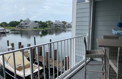 Moorings Condo | Beautifully renovated 2/2 condo on marina and short walk to private beach!