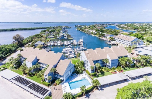 Moorings Condo | Beautifully renovated 2/2 condo on marina and short walk to private beach!