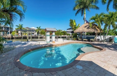 Fort Myers Beach House | Best Location on FMB! AWESOME SALTWATER POOL! WALK EVERYWHERE! 2nd floor unit