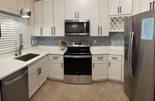Butler Beach House | Bikini Bungalow - King Beds and Short Walk to the Beach! Pet Friendly!