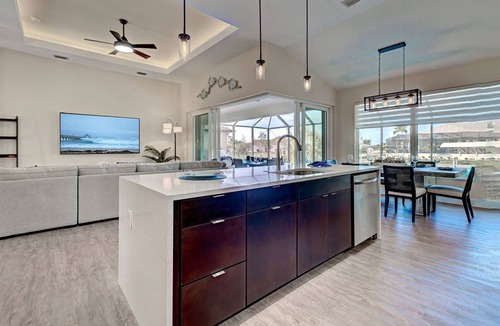 South Gulf Cove House | Blue Crush | Canal View | Seawall | 2 Masters | Hot Tub | Boat Dock