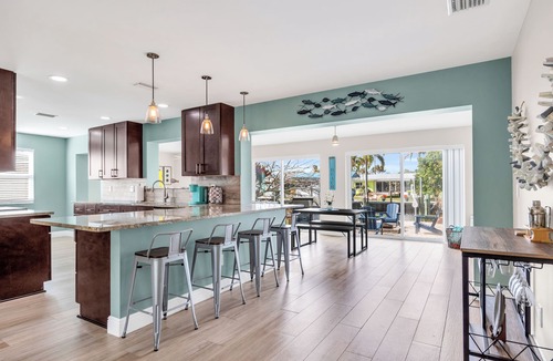 Palm City House | BOAT LIFT! Waterfront Home w/Hot Tub & Fire Pit!