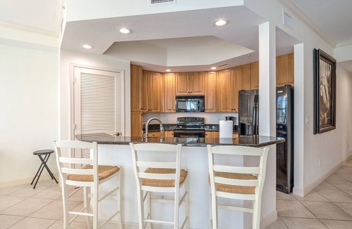 Bonita Shores Condo | Bonita Village #2203, Spiral Staircase to Resort Pool
