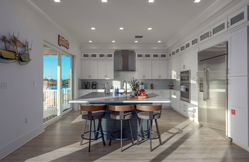 Marathon Villa | Brand New Single Family 5/5 -90ft dock, pool, paddle boards, bicycles plus more!