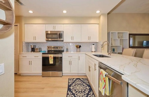 Tropical Cove Condo | Breeze On In to our 1st floor condo in Lexington Country Club, Ft Myers.
