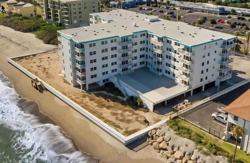 South Patrick Shores Condo | Bright & Spacious 3BR Condo by the Sea — Private Balcony + Oceanfront Pool! 🌴