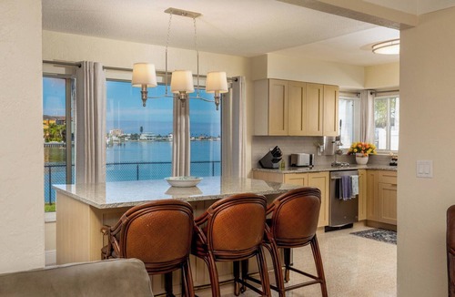 Redington Beach House | Bright Waterfront Home with Dock + Beach Close By