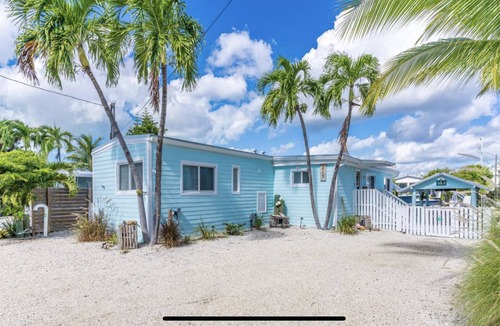 Key Largo Village House | Canal Front with Bay Access Home and private sandy beach.