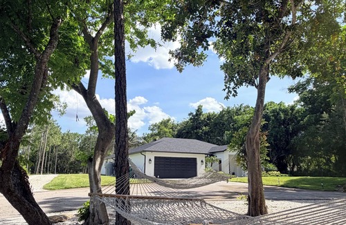 Oakes Estates House | Canopy & Coast Retreat - Escape to a private Naples retreat on 3 acres.