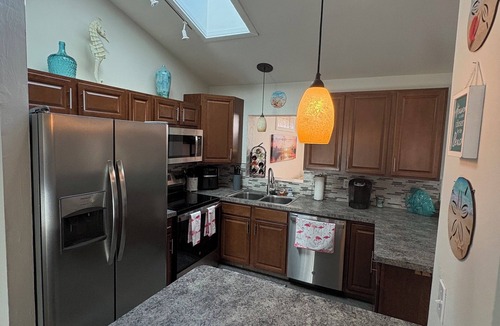Fort Myers House | Cape Coral- 3 bedroom, 2 bath, beautiful yard with hottub & lanai; pets allowed.