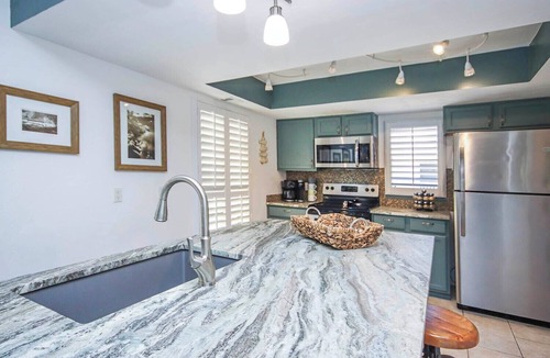 Captiva House | Captiva Island Vacation Home with Pool, Tennis, and Beach Access and King bed