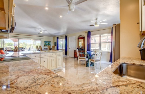 Cudjoe Key House | Casa Rosada: Cudjoe Gardens Canal Front Retreat, Pool, Tiki, Deep Dockage & Rapid Open Water Access!
