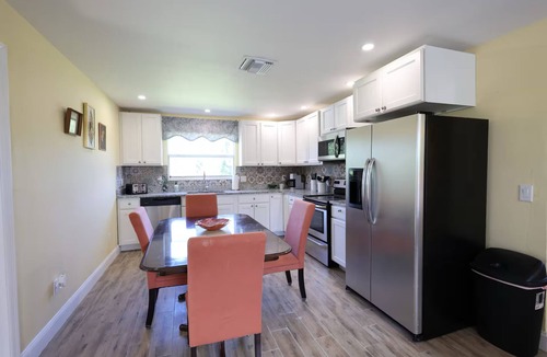 Flamingo Bay House | Charming 3-bedroom upstairs unit in a house with a shared pool in pine island