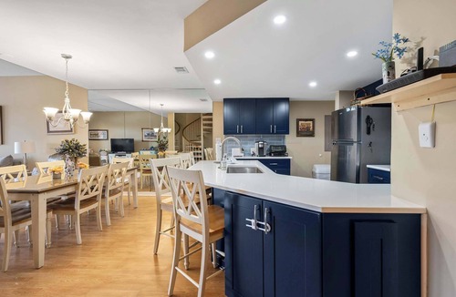 Shelter Cove Villa | Charming bay view villa with pool, washer & dryer, balcony, TV, & full kitchen