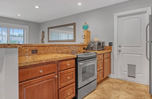 Juno Beach House | Charming Beach House just steps from Sun & Fun!